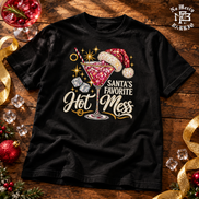 Santas Favorite Hot Mess Ruby Sparkle T Shirt Black — Flatlay creative