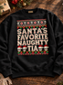 Santas Favorite Naughty Tia Besos Knit Sweater Black — Flatlay creative